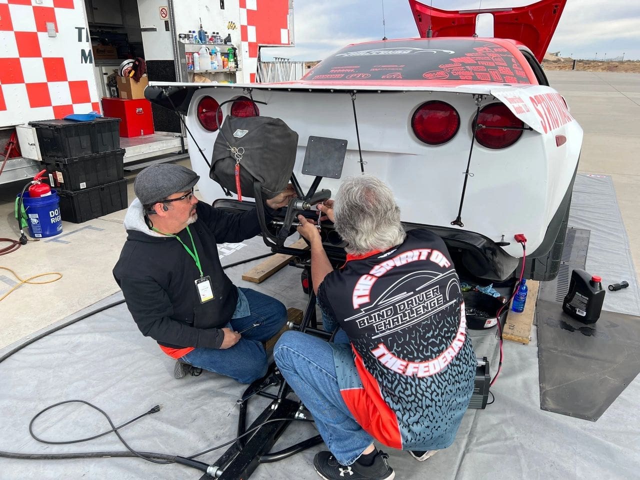 The crew preps Parker's car for his record-setting run. 