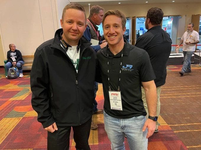 Josh Hart (left) and Justin Ashley, two the NHRA's new, smart, hard-working drivers, share a relaxed moment at the recent PRI Show at Indianapolis. 