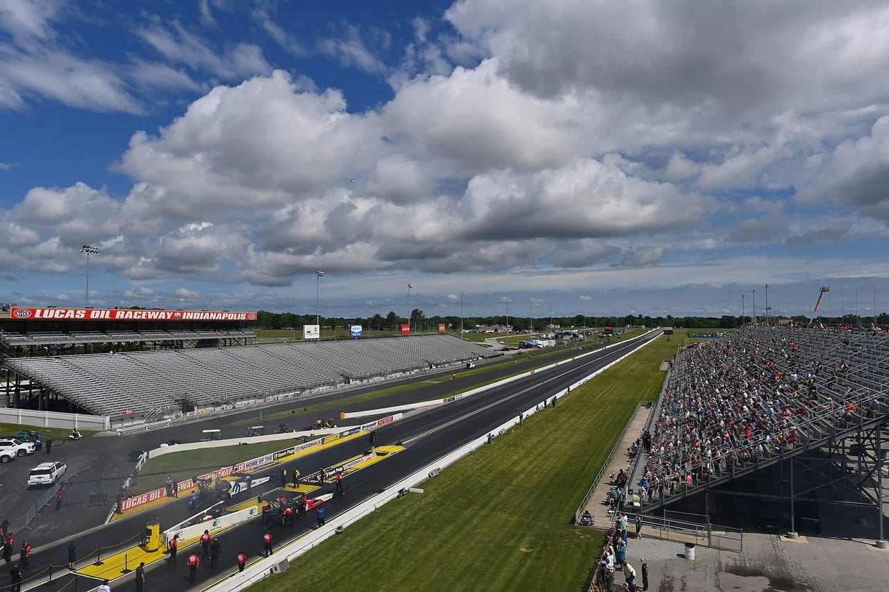 Virtually empty grandstands at Lucas Oil Raceway at Indianapolis look grim for an NHRA event, but this image actually represents a coup, of sorts, as drag racing works to stay relevant during this period of public-health restrictions. (Photo by Ron Lewis)