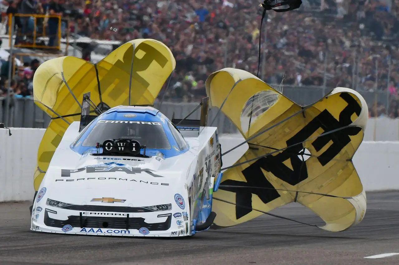 John Force would love to throw out the parachutes again before the season is over, but he announced July 31 his team will stay parked for the rest of the year. (Photo by Ron Lewis)
