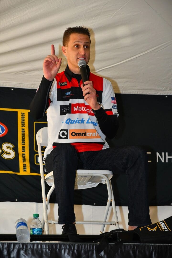 Bob Tasca loves driving his Motorcraft/QuickLane Ford Mustang but said speaking with Y.E.S. students at NHRA events is one of the best parts of his job. (Photo by Ron Lewis)